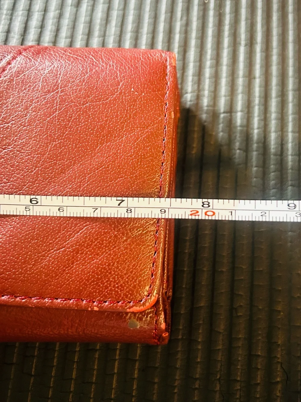 Wilson’s leather, maroon Leather trifold, wallet with Gold Accent